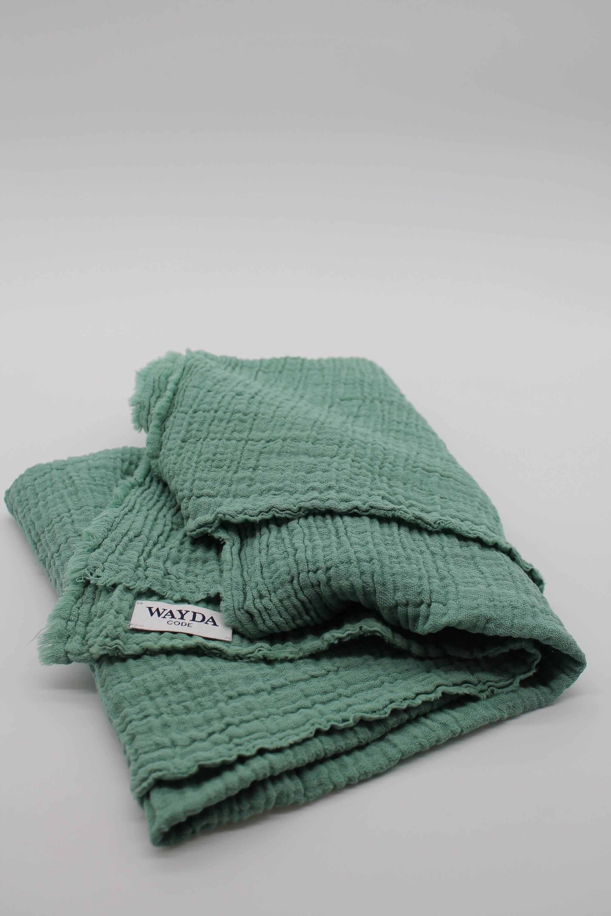 WAYDA muslin cotton scarf in jade green version edition – available in sizes 70x70cm, 100x100cm and 140x140cm, woven in Germany